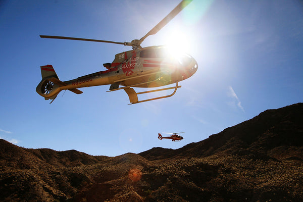 red helicopter with sky