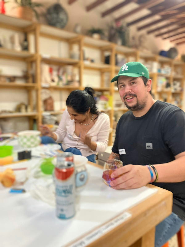 cute couple at pottery class