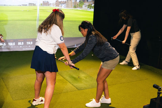 2 women golf lesson