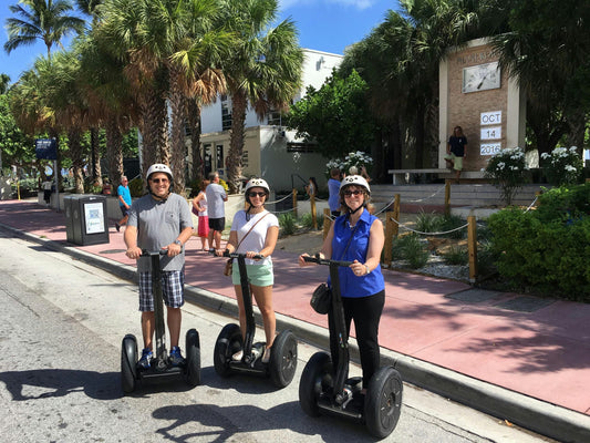 3 people on  segways.jpeg