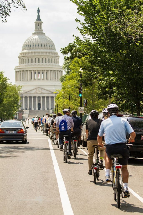 Bike Tour in front of capital on the street