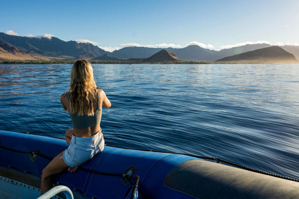 Dolphin Warrior - Dolphin Swim and Snorkel Tour girl on boat.jpeg