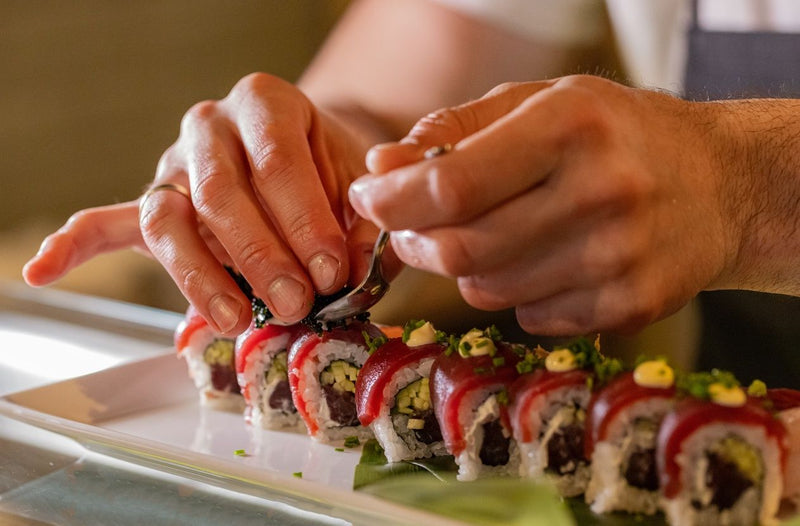 Sushi-making class taught by a professional master sushi chef and  sake-tasting tour