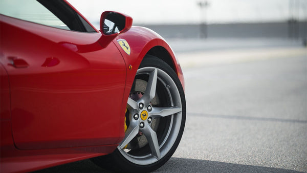 Yellow Ferrari on track