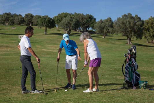 Golfers enjoying a game in sandy dunes