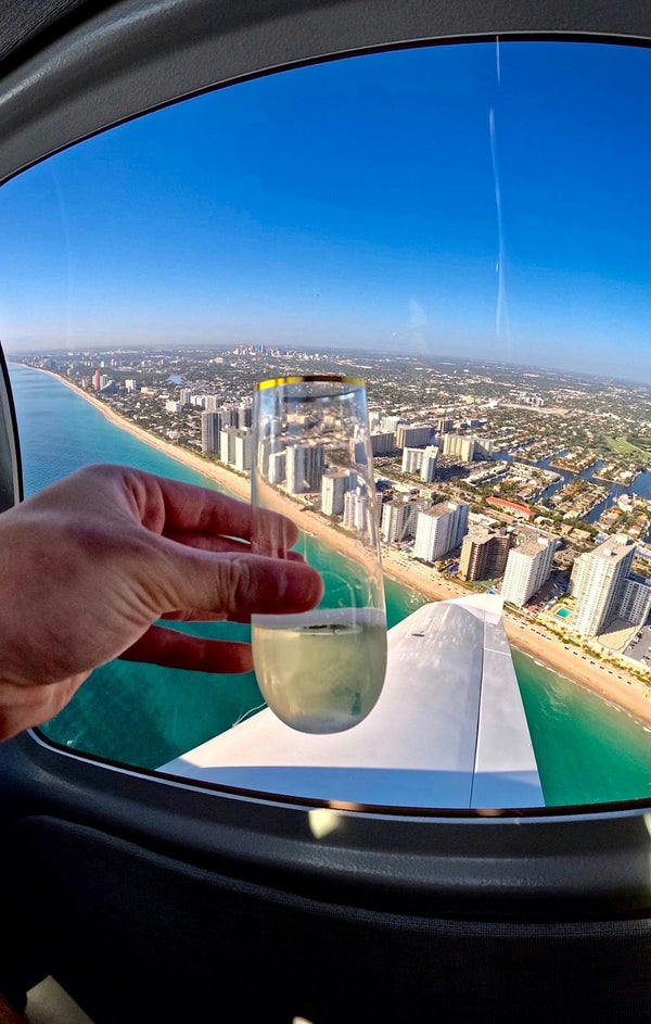 Grand SoFlo Private Airplane Tour glass of champagne.jpeg