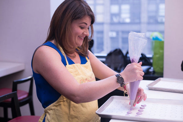 Happy woman in cooking class.jpg