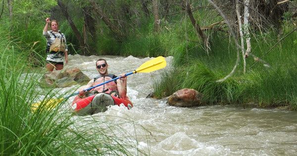 Inflatable kayak down river.jpeg