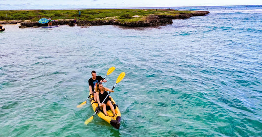 Kayakers paddling their rental kayak in Kailua near Flat Island.jpg