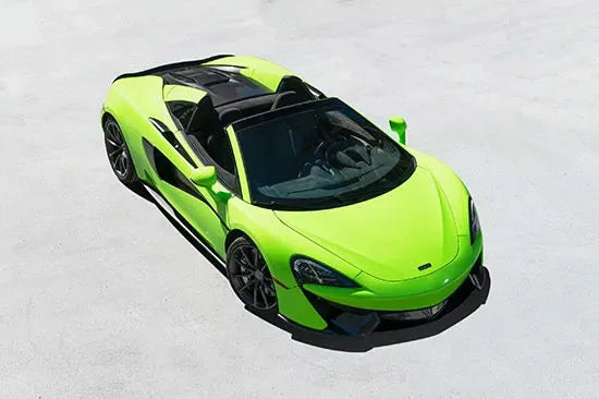 girl in front of mclaren on roof