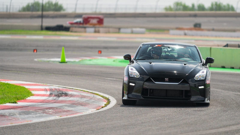 Gift Box Speed Thrills: Ride-Along with a Pro Race Car Driver