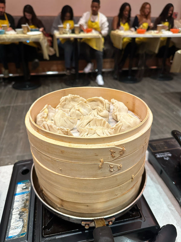 Group making dumplings