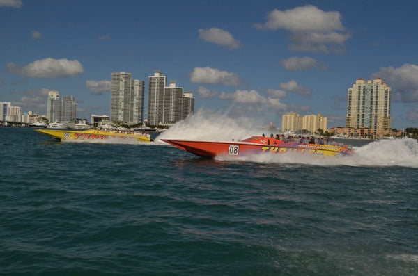 Speed boat with skyline background