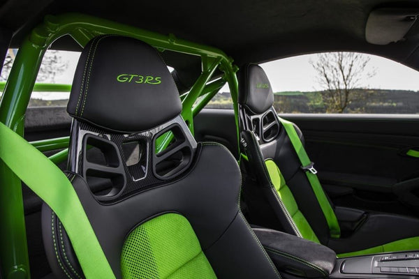 Green Porsche on track