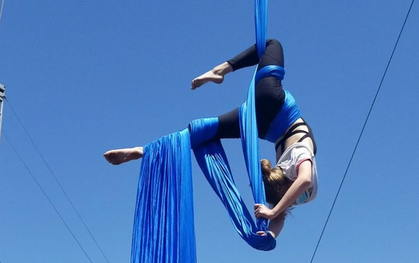 Silks hanging from blue silk.png