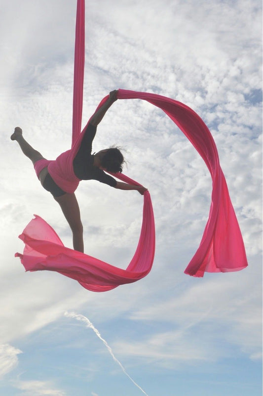 Silks hanging from blue silk.png