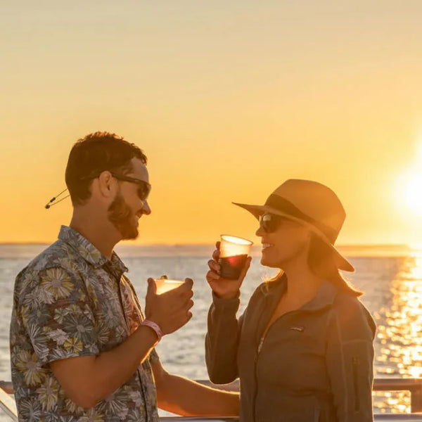 Sunset Sip & Sail boat at sunset.webp