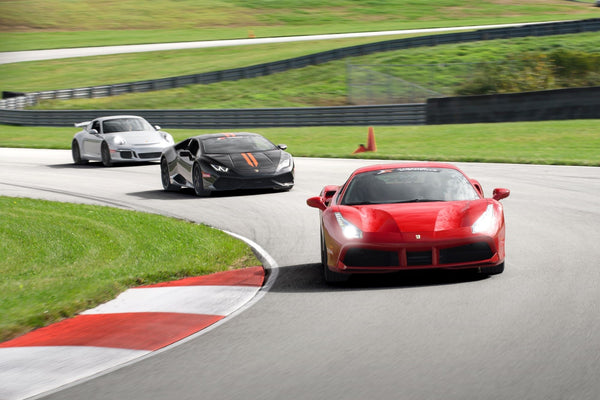 Three Supercars on Track