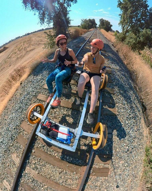 Solo Traveler Relaxing on Railbike Ride