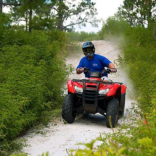 couple with atv