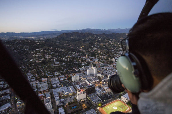 leaning out of heli shooting