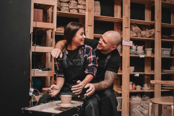 couple at pottery studio