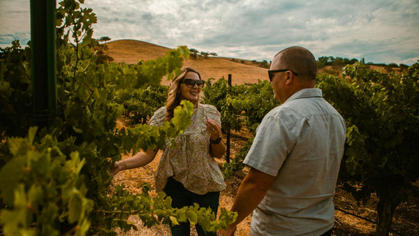 couple between vineyard.jpeg