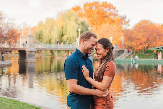 couple by water in fall