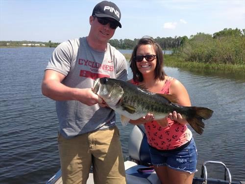 couple holding fish