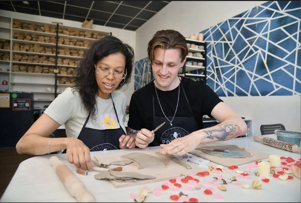 couple at pottery studio