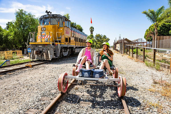 couple on railbikes