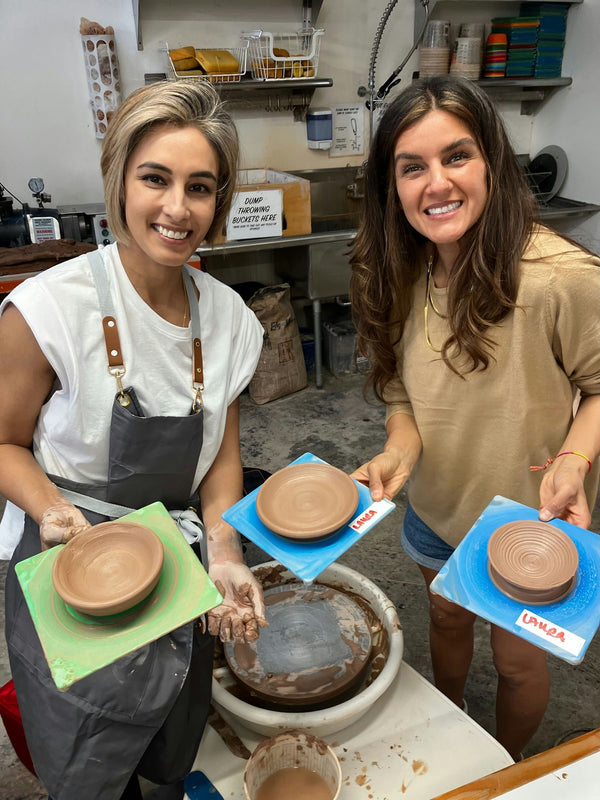 couple pottery with wheel