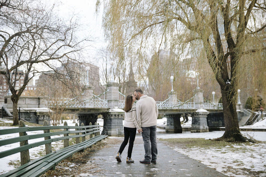 couple by water in fall