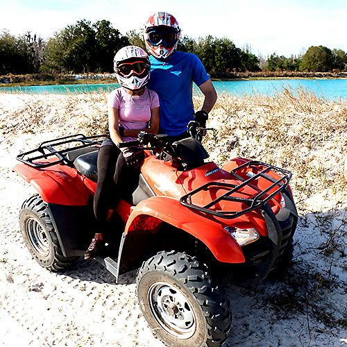 couple with atv