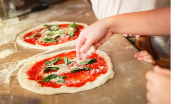 kneading pizza dough