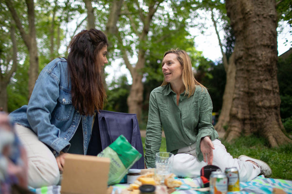 eating picnic and chatting