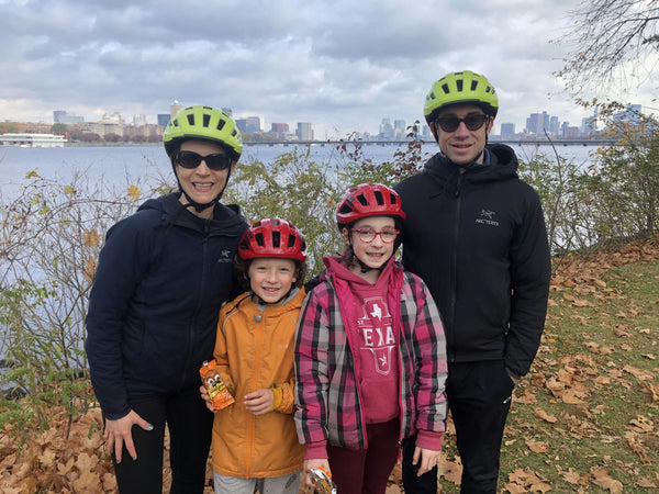 father and daughter on bikes