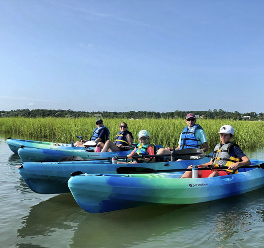 family kayaking