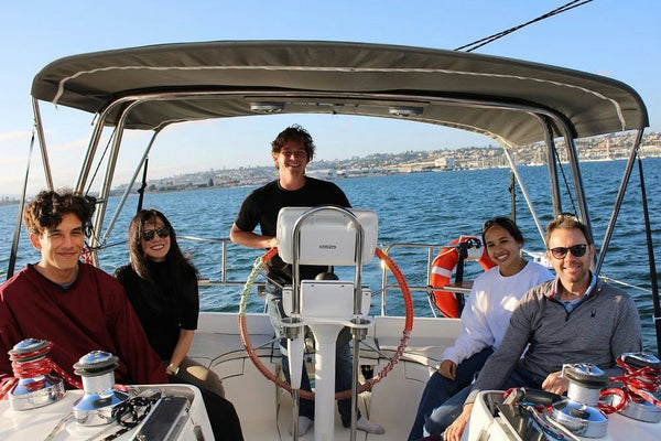 family on yacht