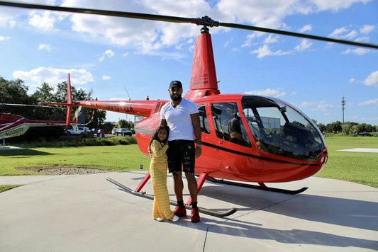 father daughter with helicopter.jpeg