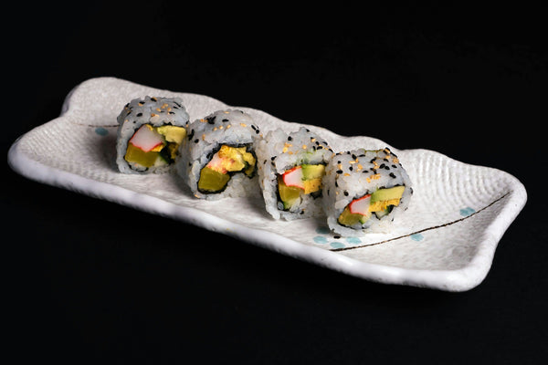 couple with final sushi plate