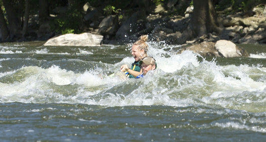 guy white water tubing