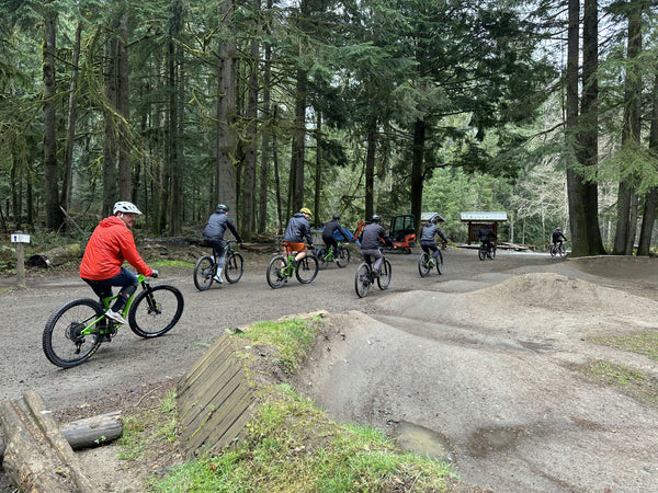 group of bikers on trail