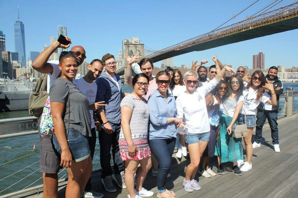 group photo by brooklyn bridge