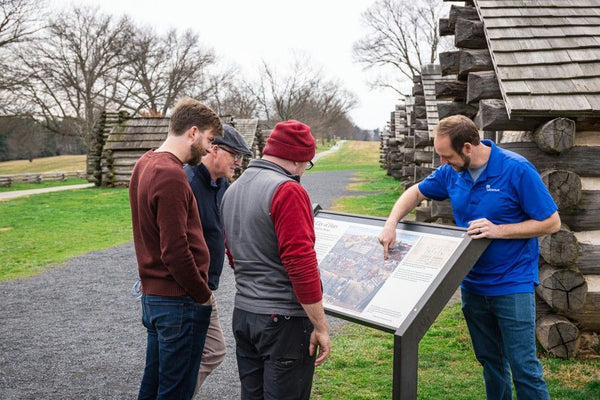 guide showing tour participants