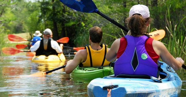 family kayaking