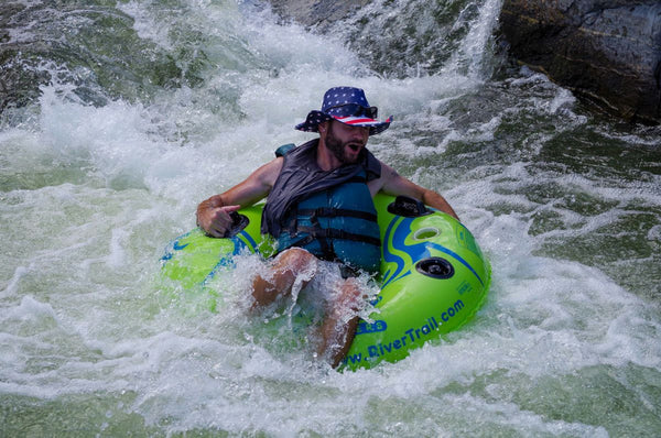 guy white water tubing