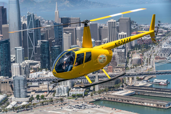 yellow helicopter and golden gate bridge