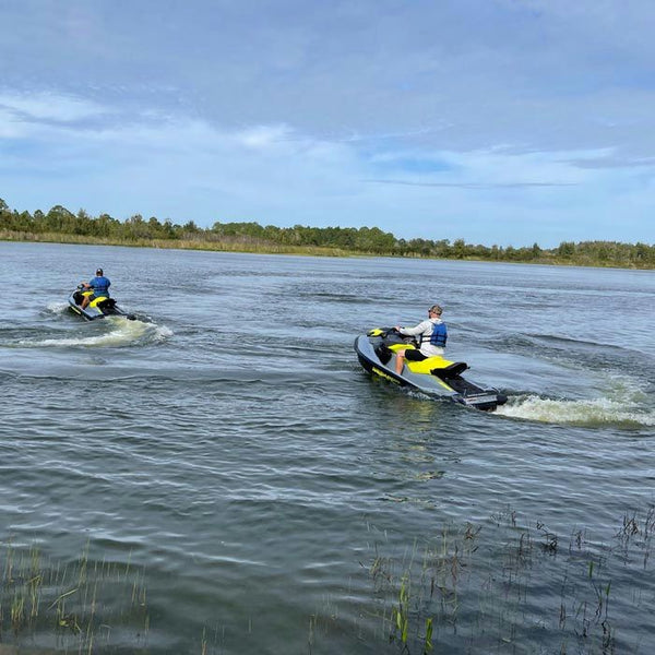 two guys on jet skis