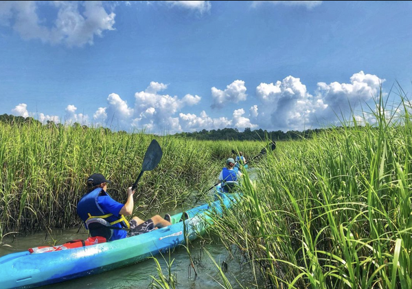 family kayaking